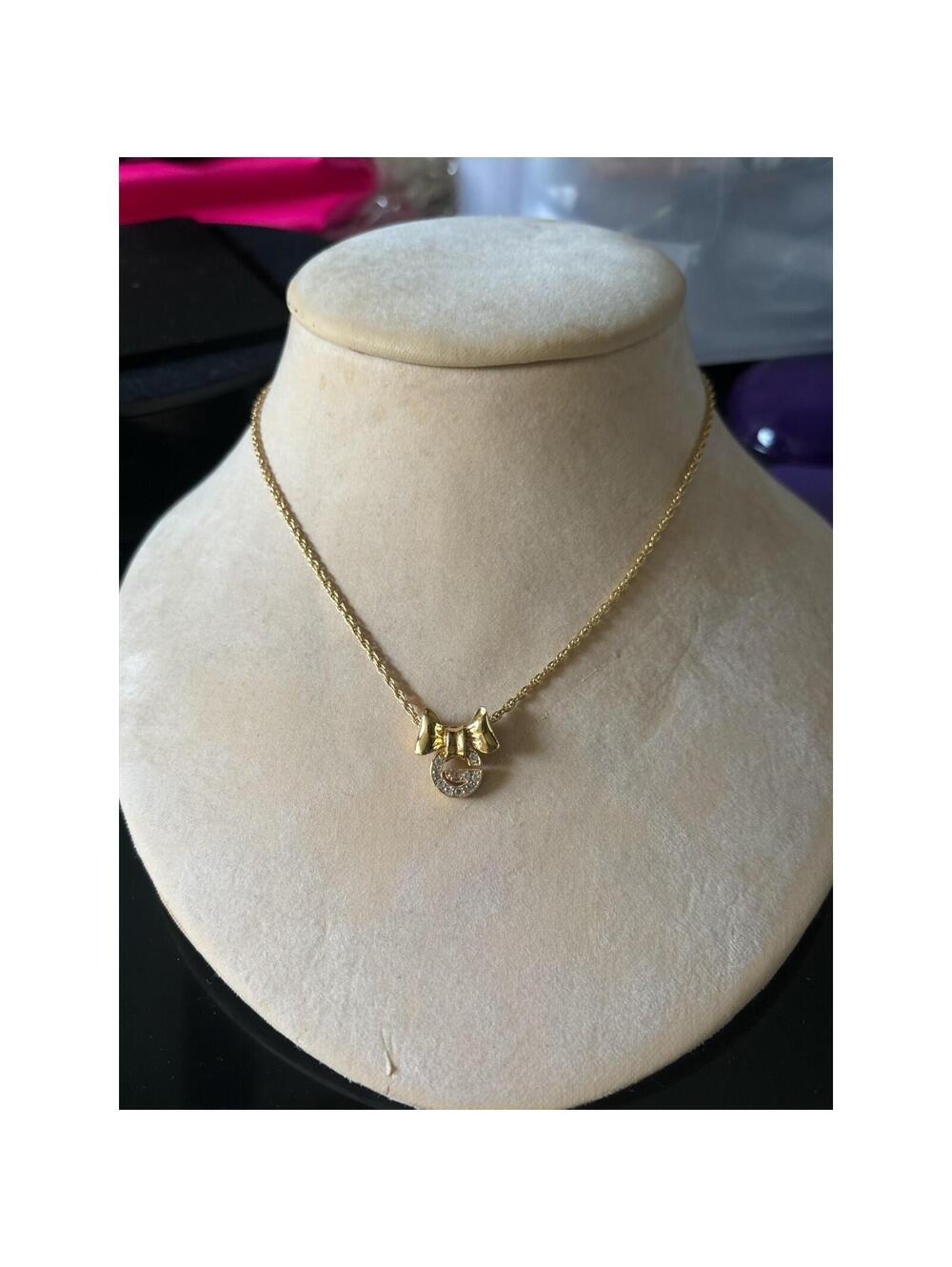 Vintage Givenchy 1980s Gold Tone Crystal Bow Pendant Necklace Signed Designer